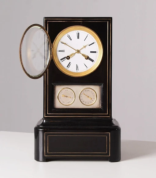 Antique mantel clock with calendar, ebonised wood, France circa 1840 - France
Wood, brass
Mid 19th century