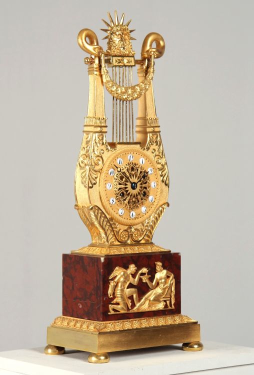 Antique French lyre-shaped mantel clock, Ormolu, Paris around 1815 - Paris
Marble, bronze
Empire around 1815