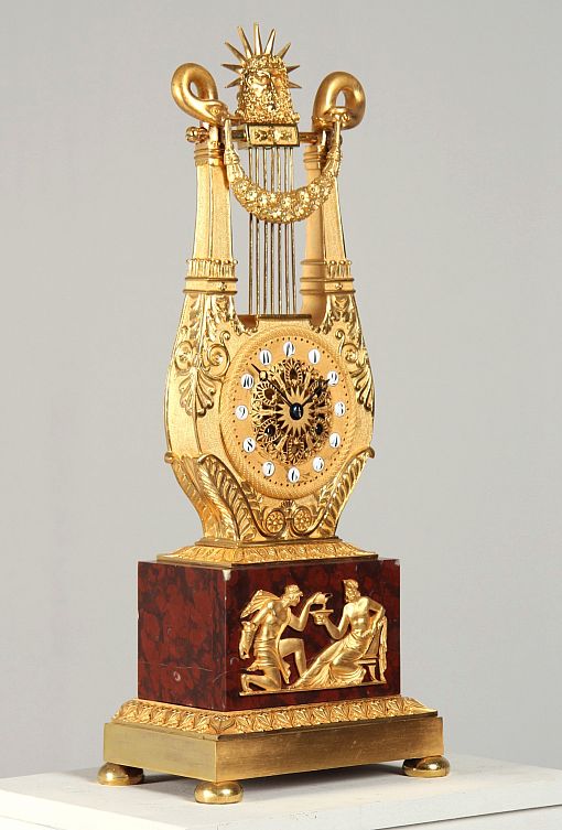 Antique French lyre-shaped mantel clock, Ormolu, Paris around 1815 - Paris
Marble, bronze
Empire around 1815