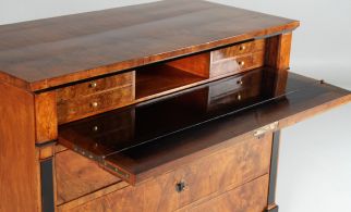 Chest of drawers with writing tablet