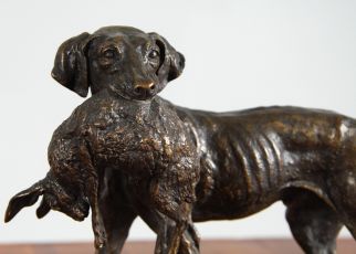 Bronze hunting dog