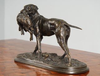 Bronze dog sculpture