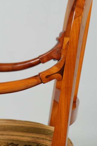 Antique Biedermeier armchair in cherry wood, circa 1830